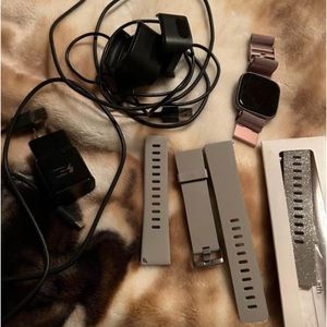 Fitbit versa 2. Excellent condition. 4 interchangeable bands and 2 chargers.